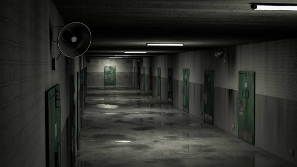 istock Top view of empty prison corridor with lights turning on. 3d render. 1829430209