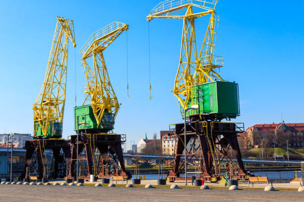 istock Old cranes on city boulevard in Szczecin, Poland 1829456362