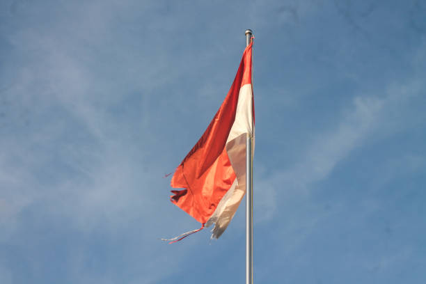 istock Old Indonesian flag on the wind 1829463379