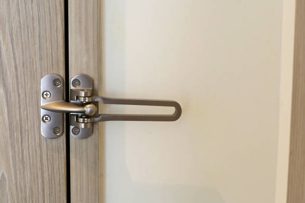 istock Locked doors in hotel room door. 1829487535
