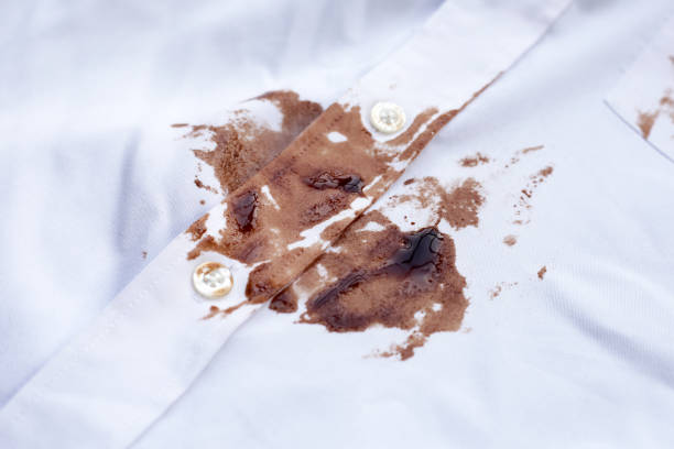 istock Dirty choclate stain on white shirt 1829491754