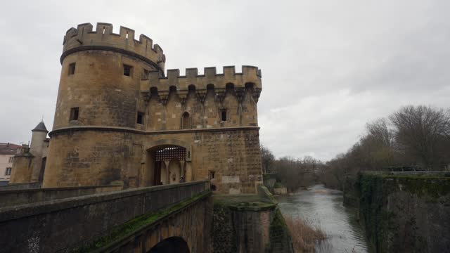 The German's Gate castle towers over the Seille River in modern France