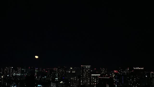 Half Moonrise on Sky Scrappers in Tokyo