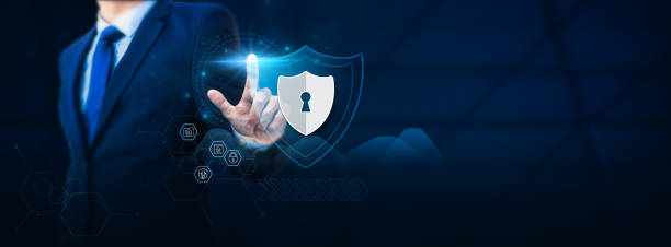istock Businessman hand touching a cybersecurity shield for digital protection. Safeguarding concept to defend against online threats, data breaches, and unexpected cyber disasters. 1829535949