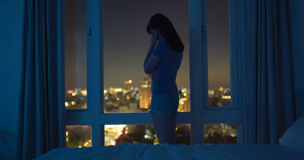 istock woman feel depression at night 1829553054