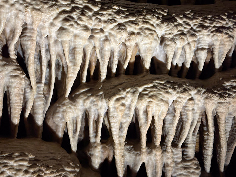 Crystal minerals in alien cave. 3D render
