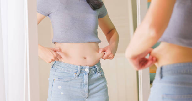 istock woman dissatisfied about body shape 1829566112