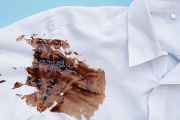 istock Dirty choclate stain on white shirt 1829572947