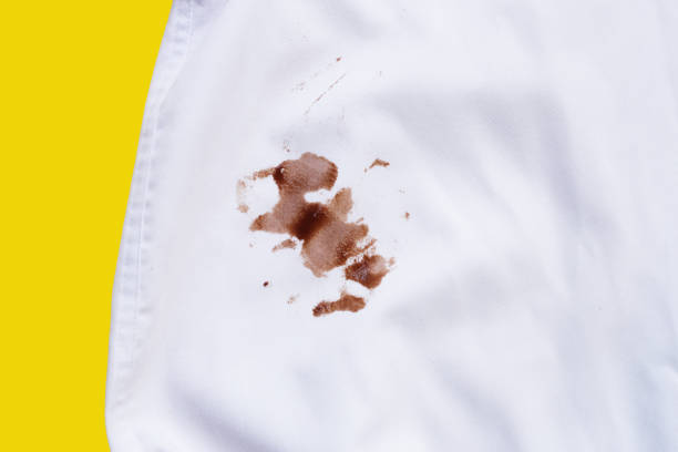 istock Dirty choclate stain on white shirt 1829573220