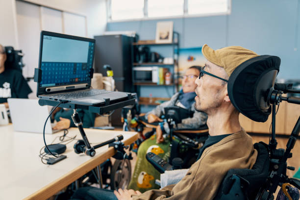 istock People with varying abilities working together in a small office 1829655895