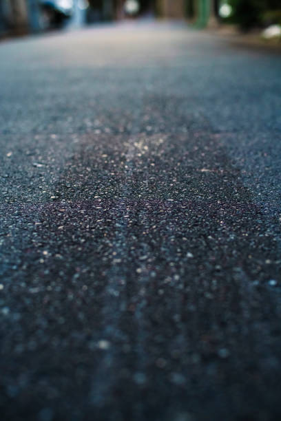 istock Tire tracks that look wet. 1829670606