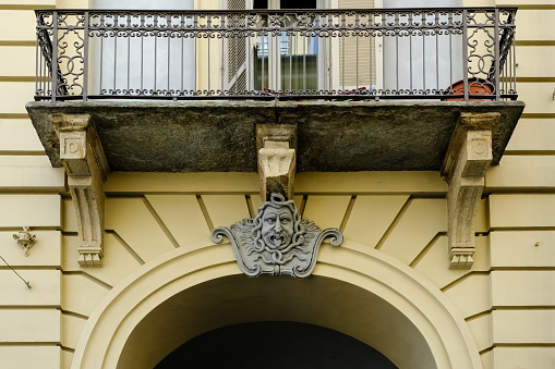 Architectural detail of Via Giuseppe Garibaldi, a pedestrian street, among the main ones in the historic center of Turin, Italy, which connects Piazza Castello with Piazza Statuto.