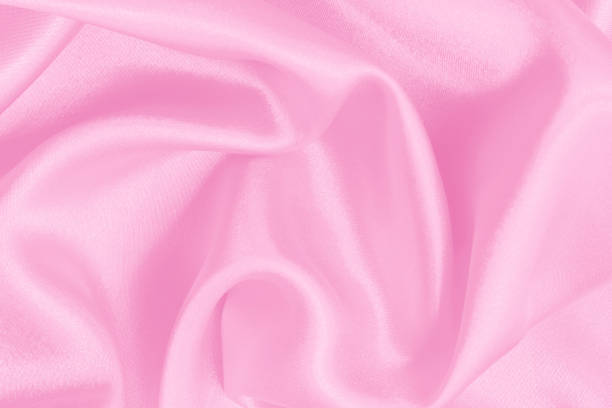 istock Pink fabric cloth texture for background and design art work, beautiful crumpled pattern of silk or linen. 1829697219