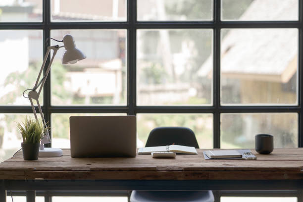 istock Image of a modern modern office work room with a personal computer laptop in the executive office emphasizes privacy and orderliness in the office. 1829698549