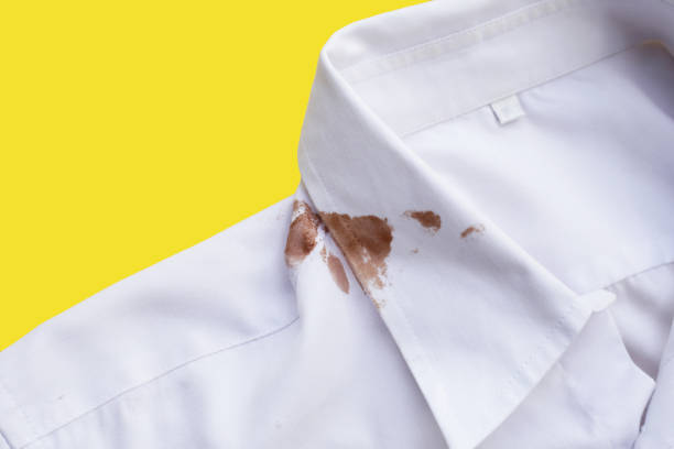 istock Dirty choclate stain on white shirt 1829720101