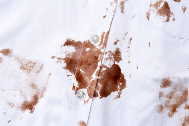 istock Dirty choclate stain on white shirt 1829720133