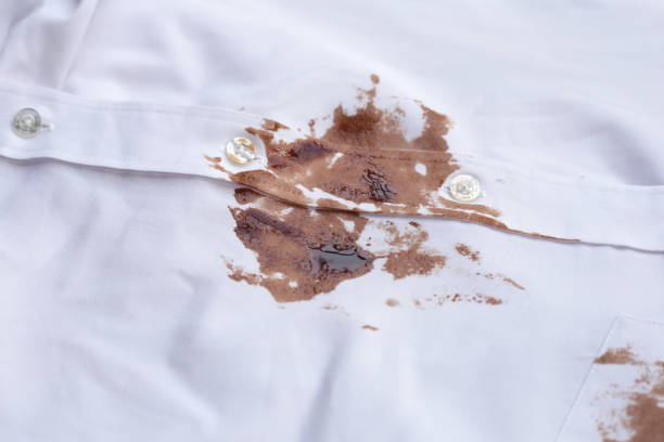 istock Dirty choclate stain on white shirt 1829732394