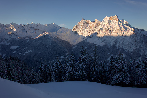 Sunrise in the swiss alps after a heavy snowfall in december at Eggberge, Altdorf Uri, Switzerland.