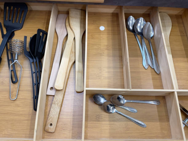 istock Kitchen utensils in a wooden drawer. 1829865877