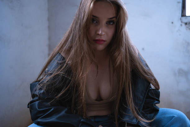Young woman in an abandoned place.