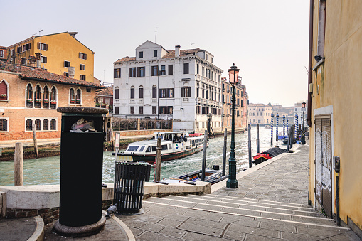 Venice, Italy - February 21, 2022: Looking out across the magnificent Grand Canal in Venice from the iconic Rialto Bridge.