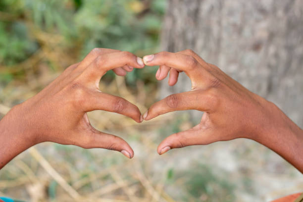 istock A man showing two hand and ten fingers and blur background 1829916385