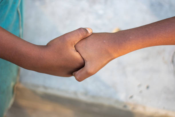 istock A man making handship with another man and blurred background 1829916927