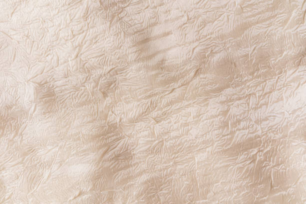 istock festive,wedding, textile with pattern background. Beige Bloom, Ivory Champagne, Creamy Abstract Texture Background. A copy of the space. 1829920649