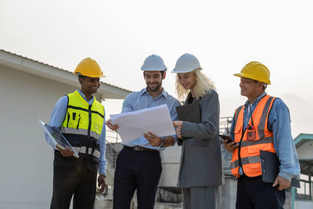 istock Electrical Engineer Technician meeting clean and green alternative energy concept. Architectural engineering working with solar energy equipment on construction sites, meeting, clean energy 1829924867