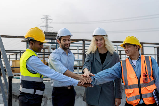 istock Electrical Engineer Technician meeting clean and green alternative energy concept. Architectural engineering working with solar energy equipment on construction sites, meeting, clean energy 1829924890