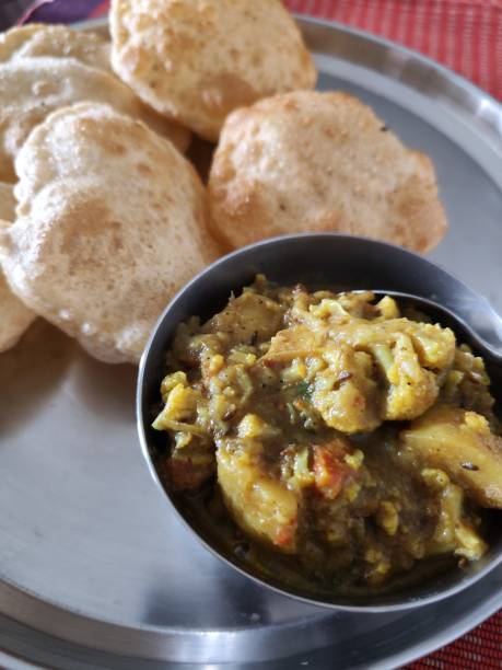 istock Indian cuisine Poori Sabji in a plate 1829952812