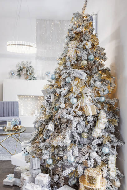 istock Designer Christmas tree in decorated living room 1829958180