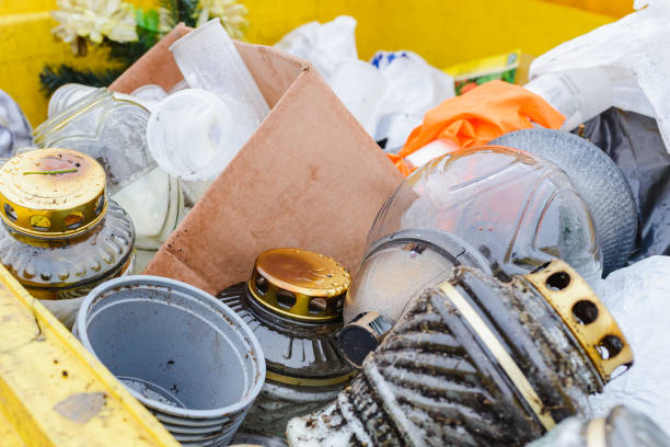 istock Cemetery trash bin filled discarded candles.Close-up. 1830015581