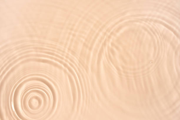 istock water texture ripples wave clean transparent water abstract background in beige color 1830024892