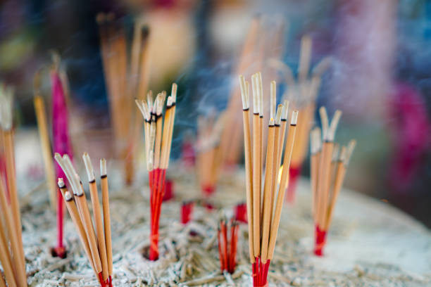 istock Closeup image of many incense sticks placed on a joss stick pot as a merit-making ritual in a Chinese temple, Chiang Mai, Thailand. 1830040064