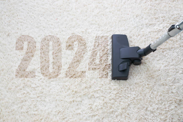 istock 2024 New year home cleaning with vacuum cleaner and copy space for a text 1830041642