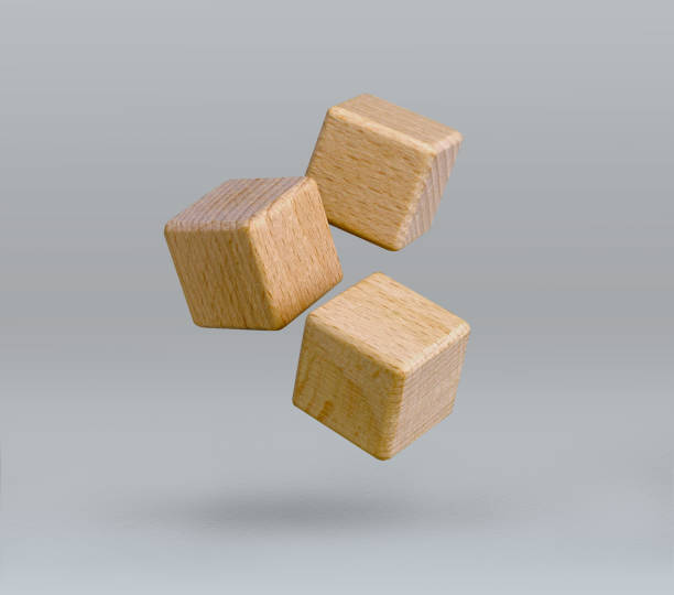 istock Wooden blocks flying over grey background. 1830071587