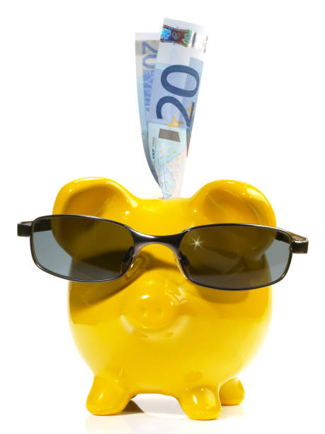 Piggy Bank with Sunglasses on white Background - Isolated Piggy Bank with Sunglasses on white Background sonnenbrille stock pictures, royalty-free photos & images
