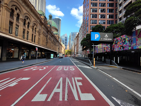 Bus lane by the Queen Victoria Building, a heritage-listed late-nineteenth-century building in the Sydney central business district, New South Wales, Australia.