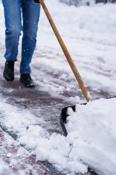 istock A man with a snow shovel 1830090216