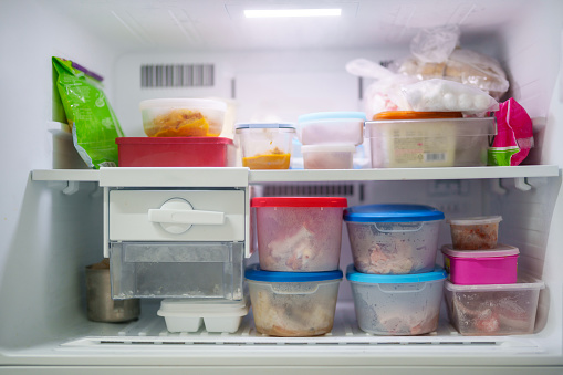 Close-up view of the inside of a well stocked refrigerator