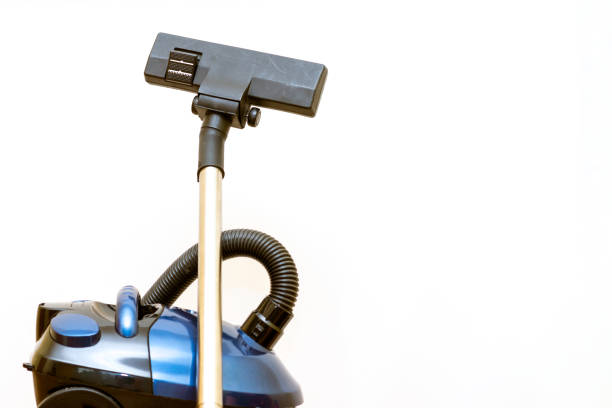 istock Cleaning concept - vacuum cleaner on white background close up 1830111766