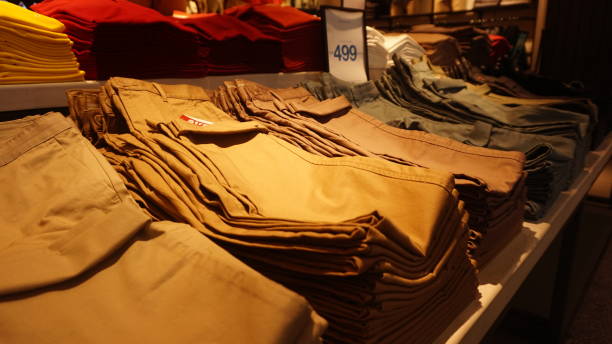 istock MEN'S PANTS COLLECTION AS A STORE DISPLAY 1830129619