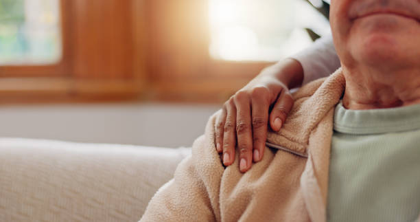 istock Senior patient, hands on shoulder or consulting a caregiver for support or empathy for healthcare help. Closeup, cancer or elderly person in counselling with calm nurse in nursing home for therapy 1830134687
