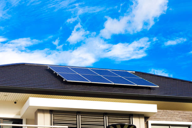 istock Rooftop with solar panels in blue sky  in Bangkok Senanikhom 1830137478