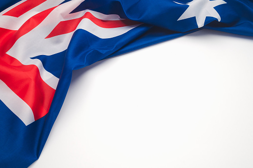 Part of the Australian flag on a white background. Top view. Flat lay. Space for text