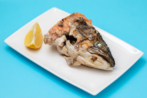 Salmon head Steak grilled whit salt and lemon.