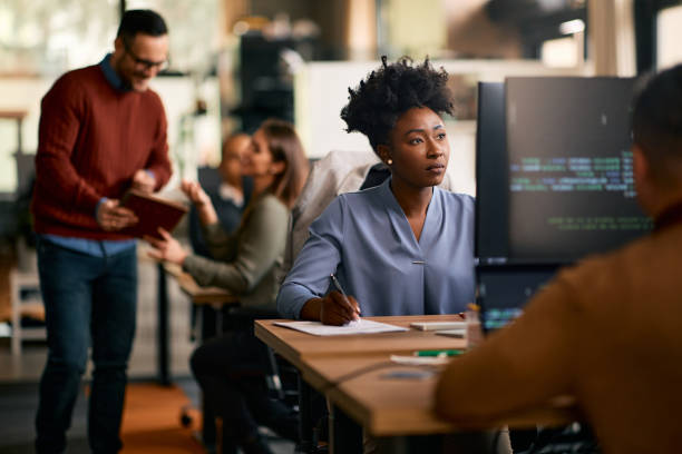 istock Black female graphic designer working on computer in the office. 1830160970