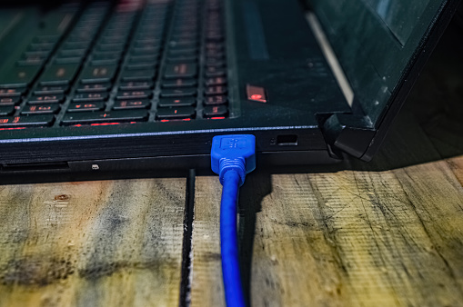 USB cable connected to the laptop