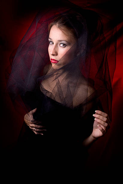 istock Attractive female wrapped black tulle 183017884